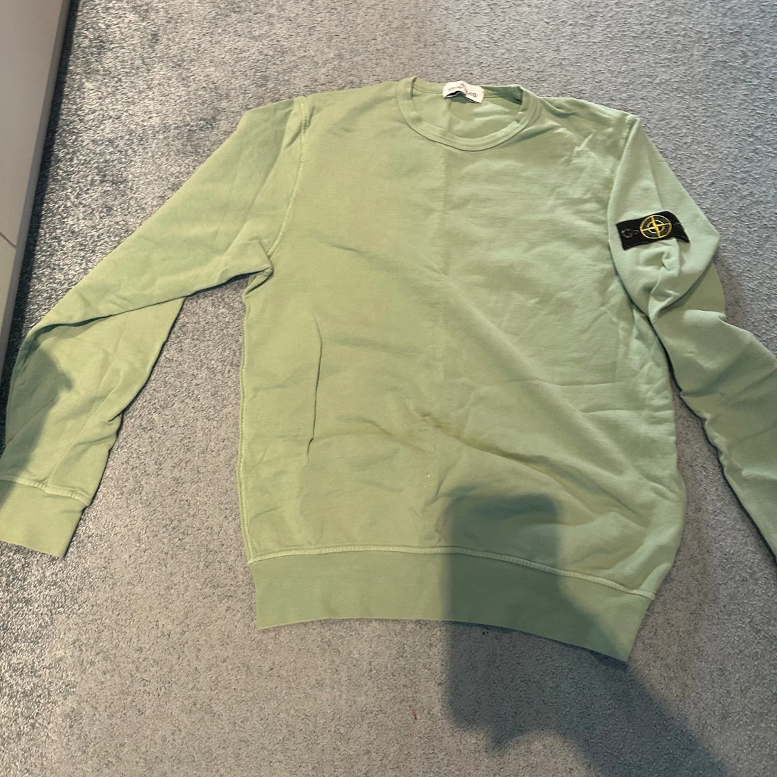 Grön Stone Island sweatshirt