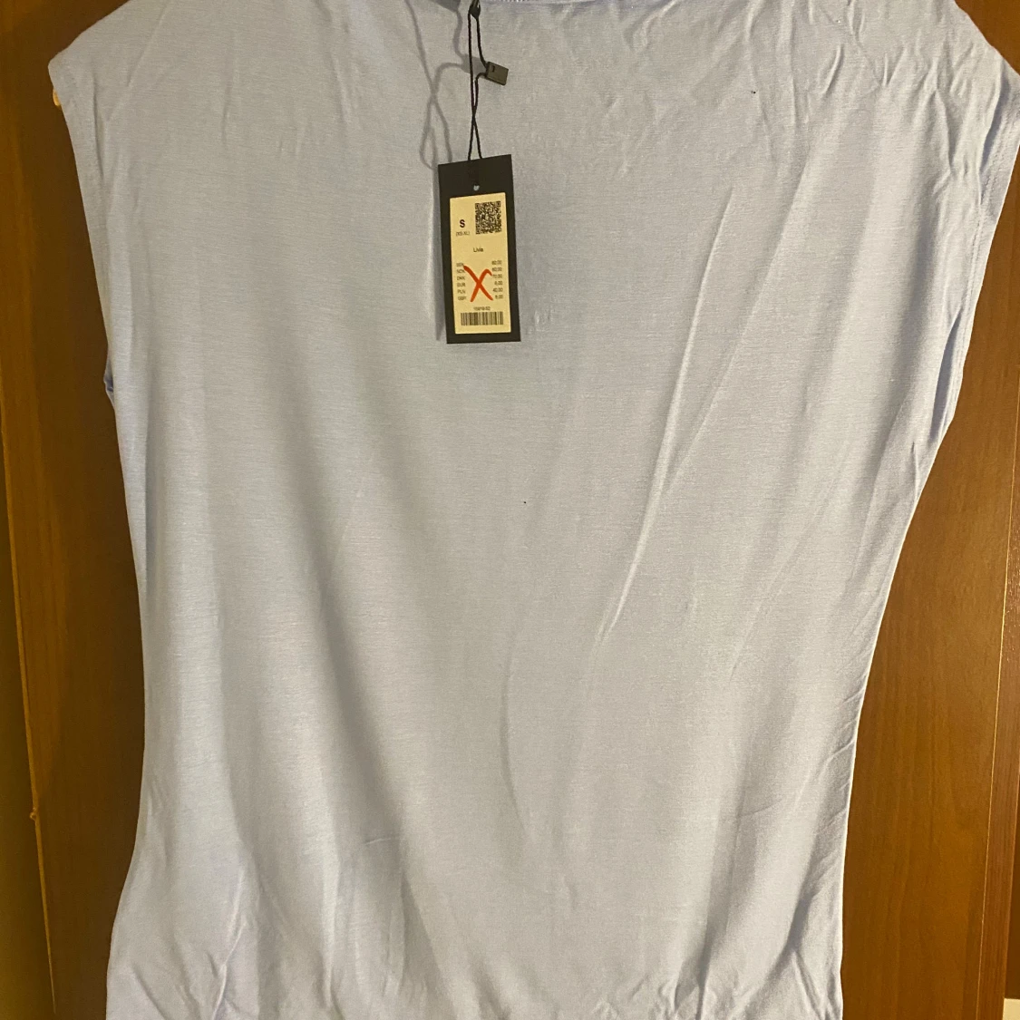 Ljusblå ärmlös topp Livia S - 1