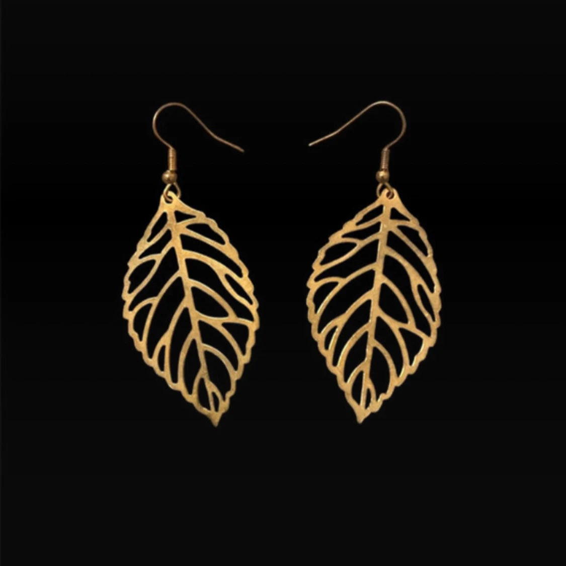 Guldiga örhängen i bladform - 1