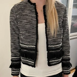 Kappa - Mönstrad kort kappa