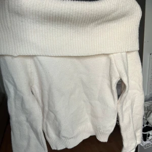 Stickad tröja  - Stickad tröja som man kan vika ner