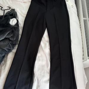 Kosymbyxor - Helt oanvända Vilma petite kostymbyxor.