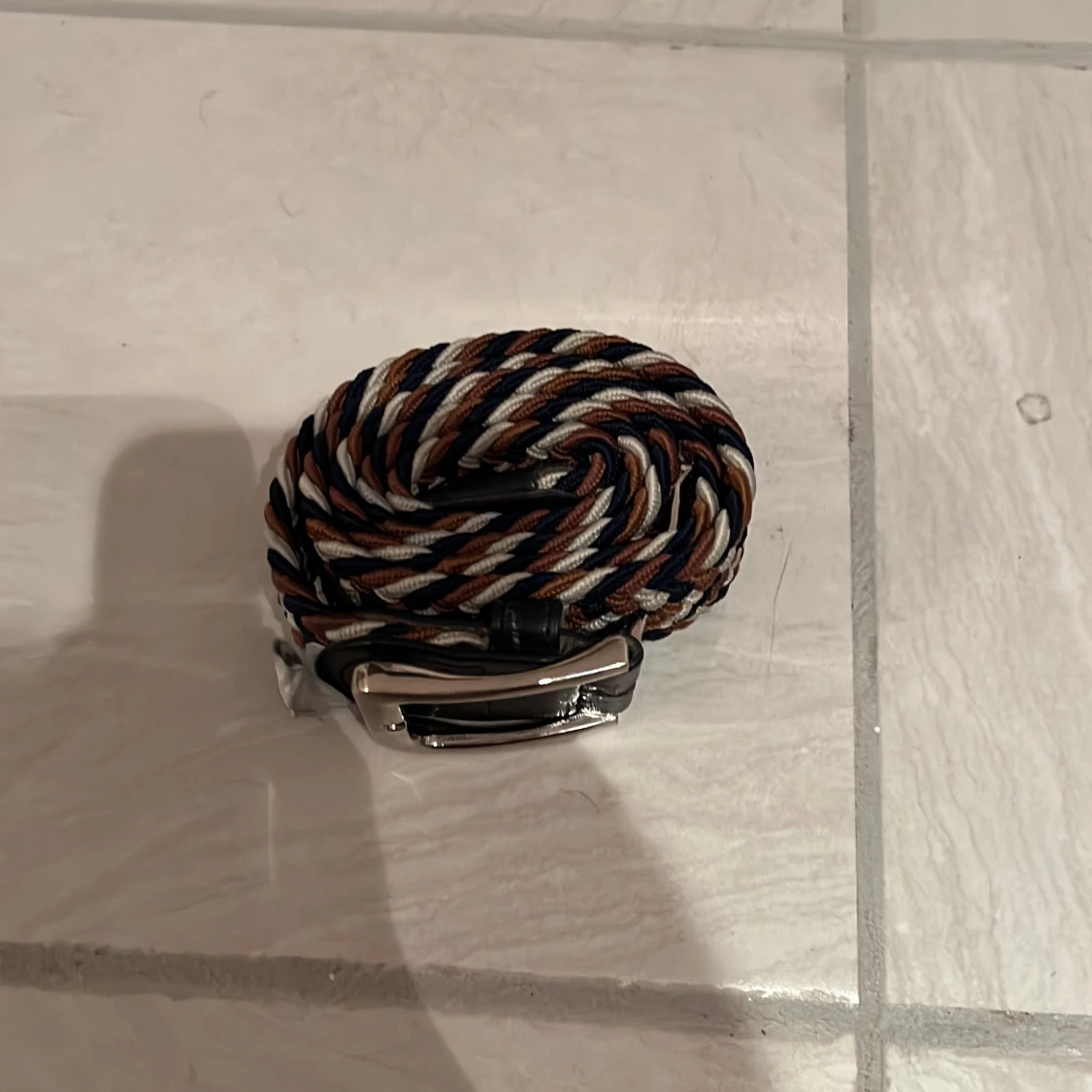 Flätat bälte med spänne