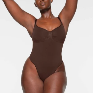 Skims bodysuit  - Seamless sculpt bodysuit from skims. Brand new, I was unable to wear it cause I ordered it in the wrong size. Color: Espresso Size: Small