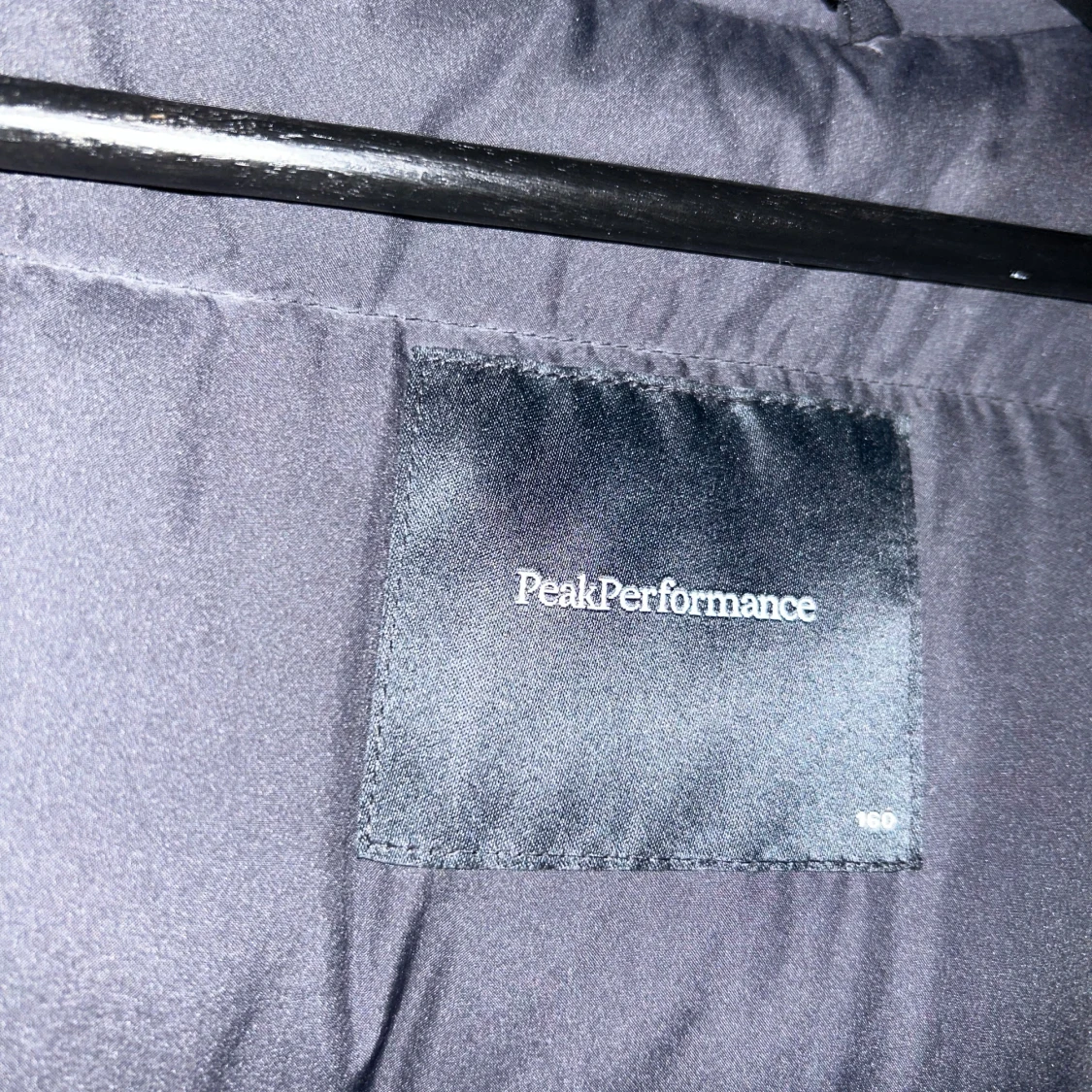 Svart dunjacka från Peak Performance - 91