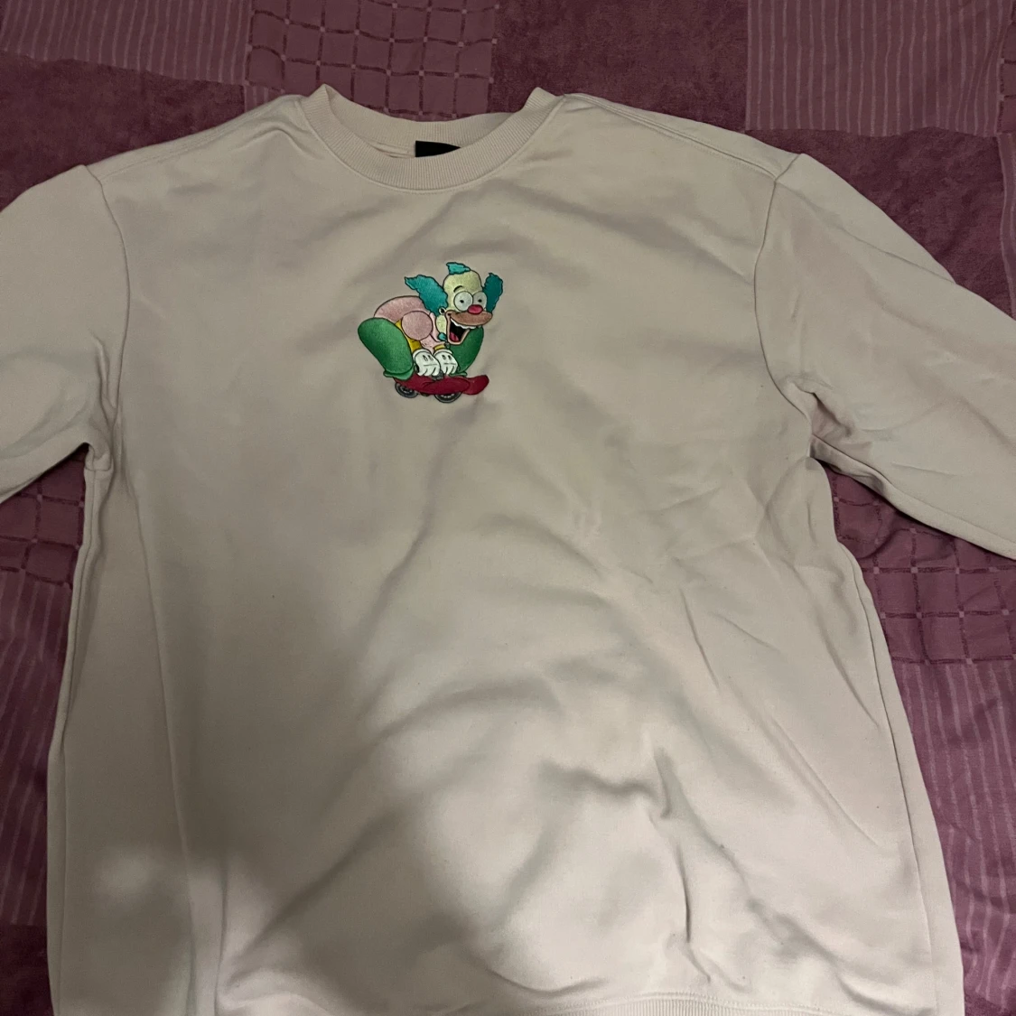 Rosa sweatshirt med tecknad figur