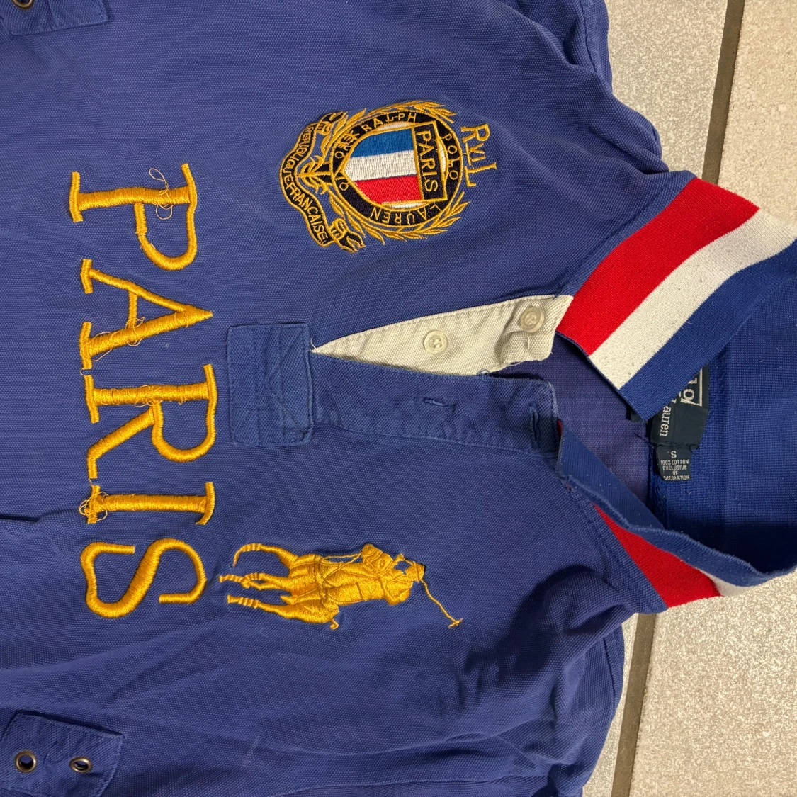 Blå pikétröja från Ralph Lauren - 90