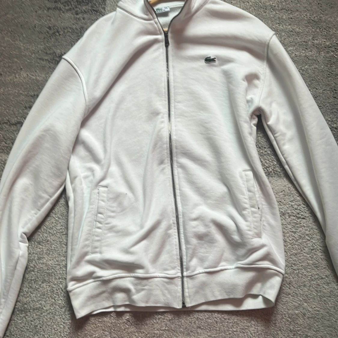 Vit zip-tröja från Lacoste - 1