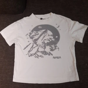 Nasa white t-shirt - It's a normal white Nasa t-shirt from H&M. I've barely used and it's baggy from the sides.