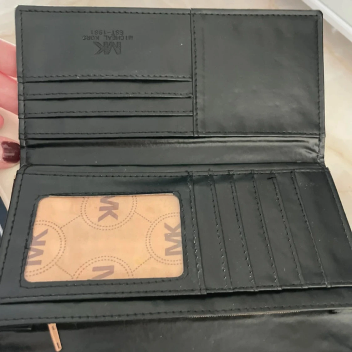 Ormskinnsmönstrad plånbok från Michael Kors - 90