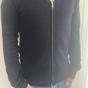 East west kofta  - Stickad kofta använd fåtal gånger 