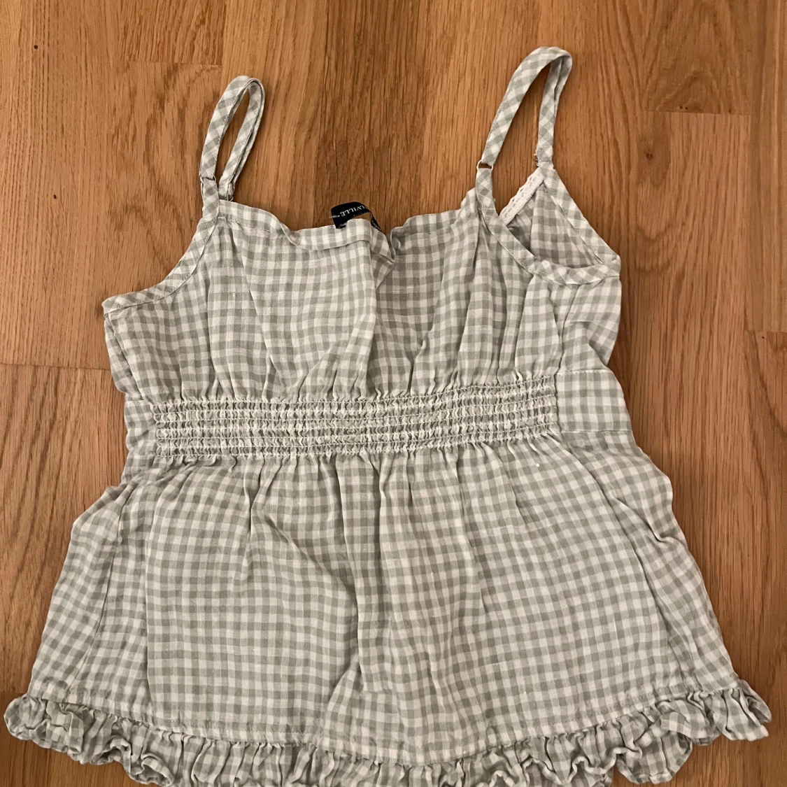 Rutig linnetopp från Brandy Melville - 91