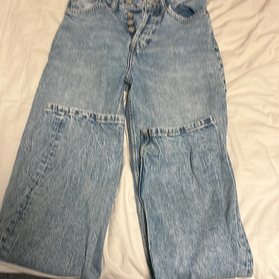 Blå jeans med knappar - 90