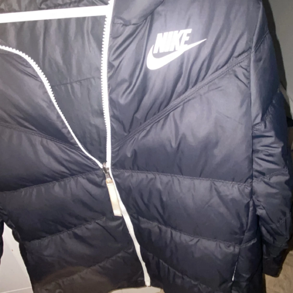 Svart dunjacka från Nike - 90