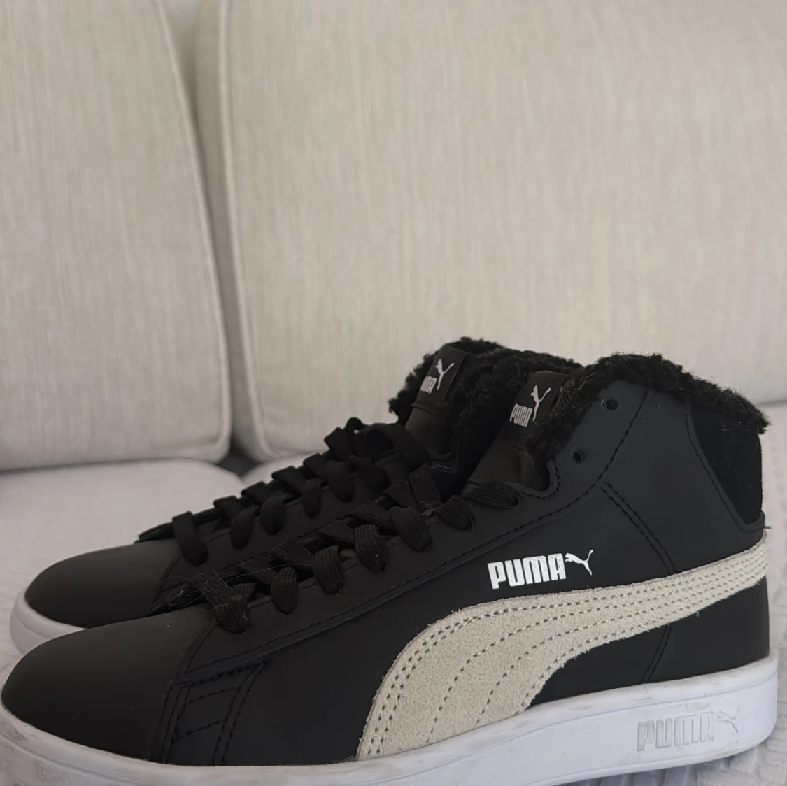 Svarta sneakers från Puma med foder - 90