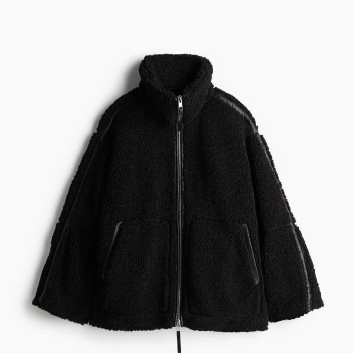 Svart teddyjacka med dragkedja