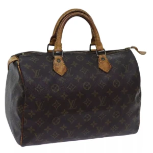 Louis Vuitton Speedy 30 - Louis Vuitton Speedy 30. Ett måste i väskkollektionen! Bra storlek för både vardagsbruk och resor. Perfekt att använda som skol-/arbetsväska. Speedy ger en touch av lyx och stil till varje outfit.