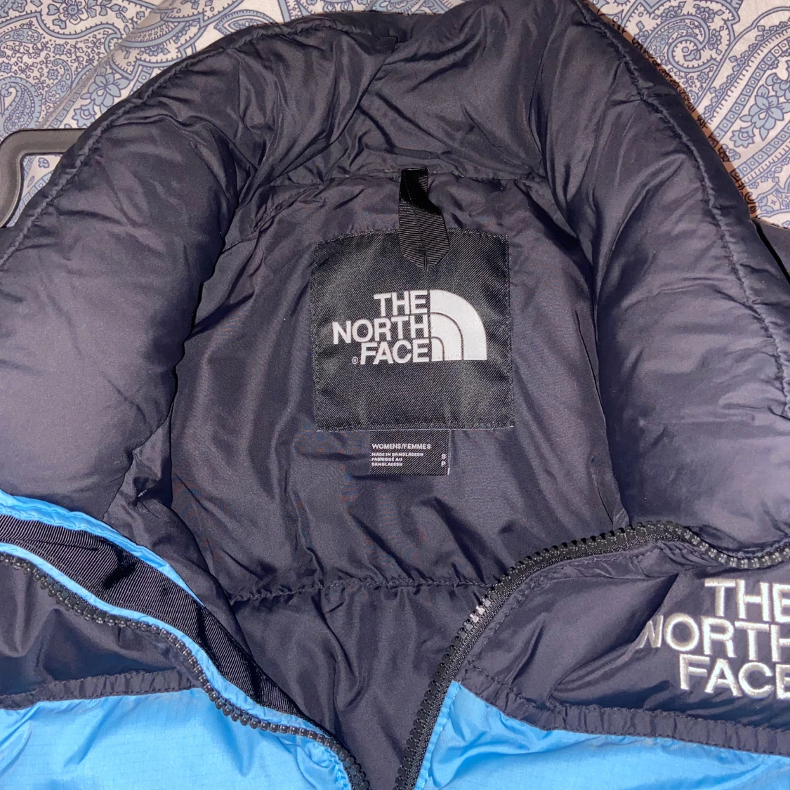 Blå pufferjacka från The North Face - 92