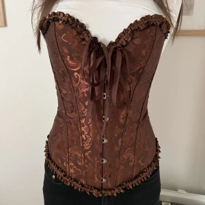 Brun Korsett - Oanvänd, skriv privat vid fler frågor😊storlek M men passar som XS
