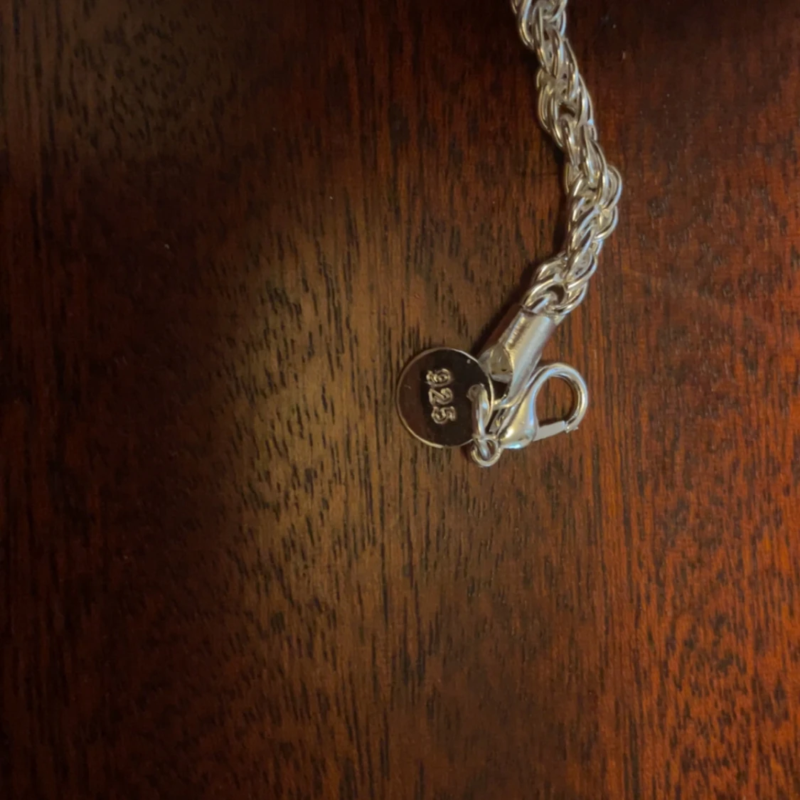 Silverfärgat armband i flätad design - 90