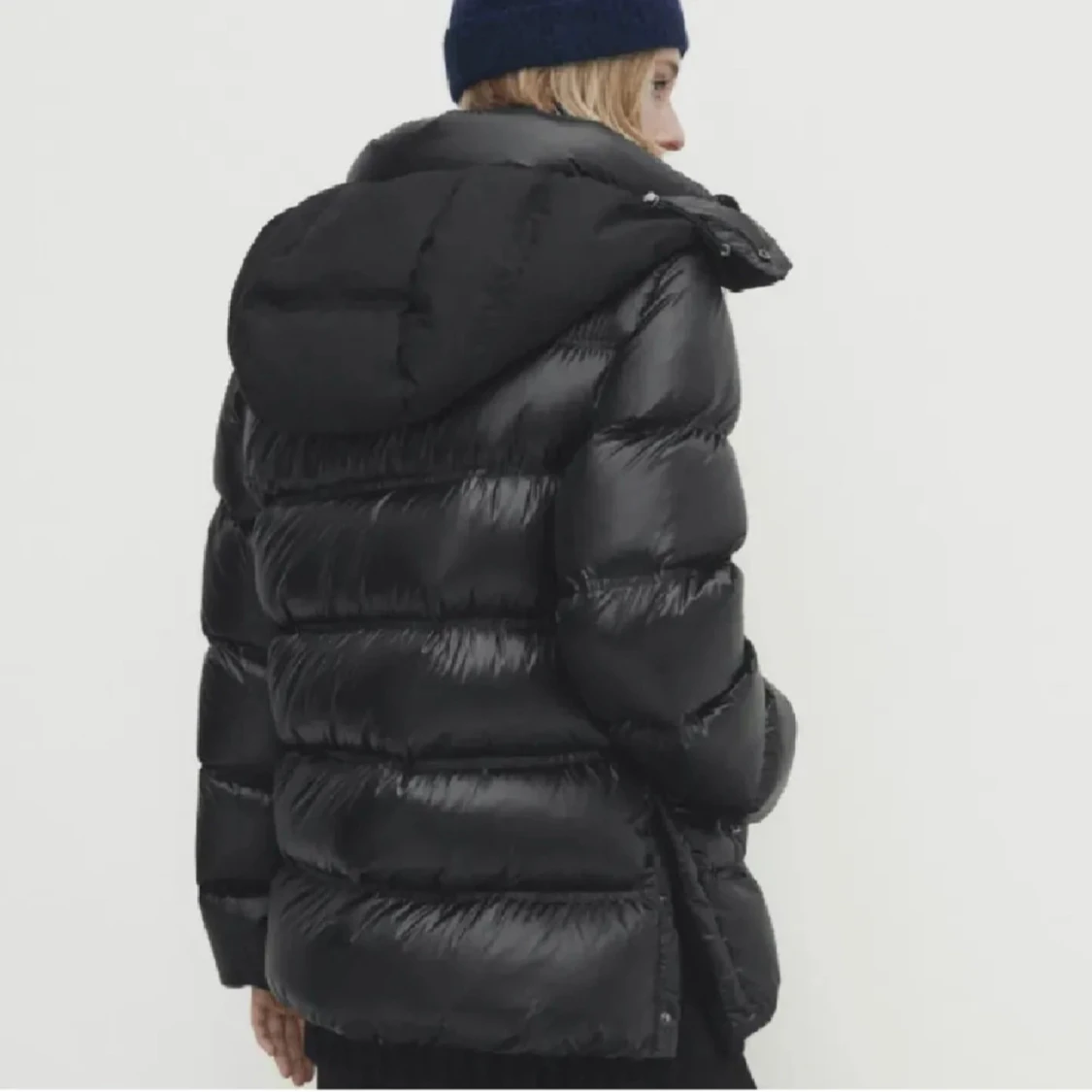 Svart pufferjacka intressekoll - 90