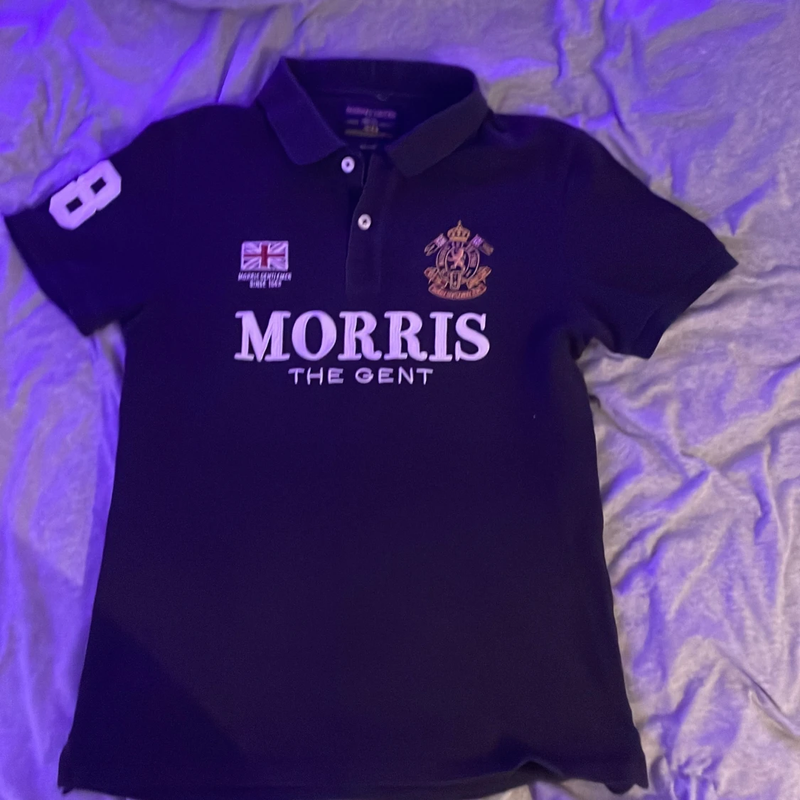 Svart pikétröja från Morris