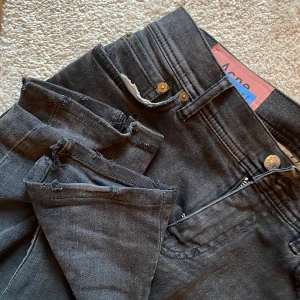Svarta jeans från Acne Studios - Vintage Acne Studios, Blåkonst, North Used Black. Strl 28/32.