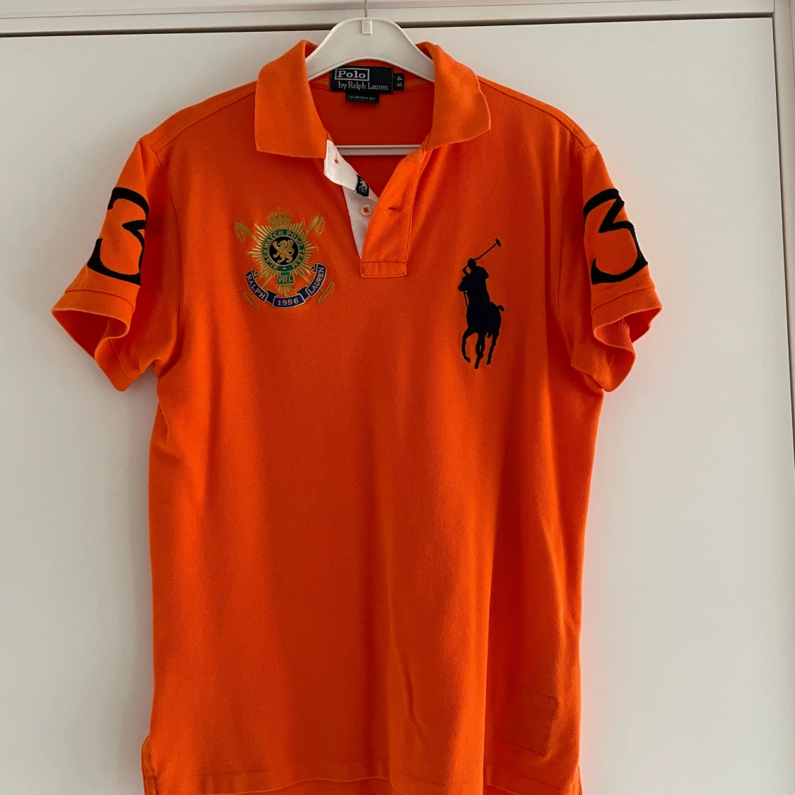 Orange pikétröja från Ralph Lauren