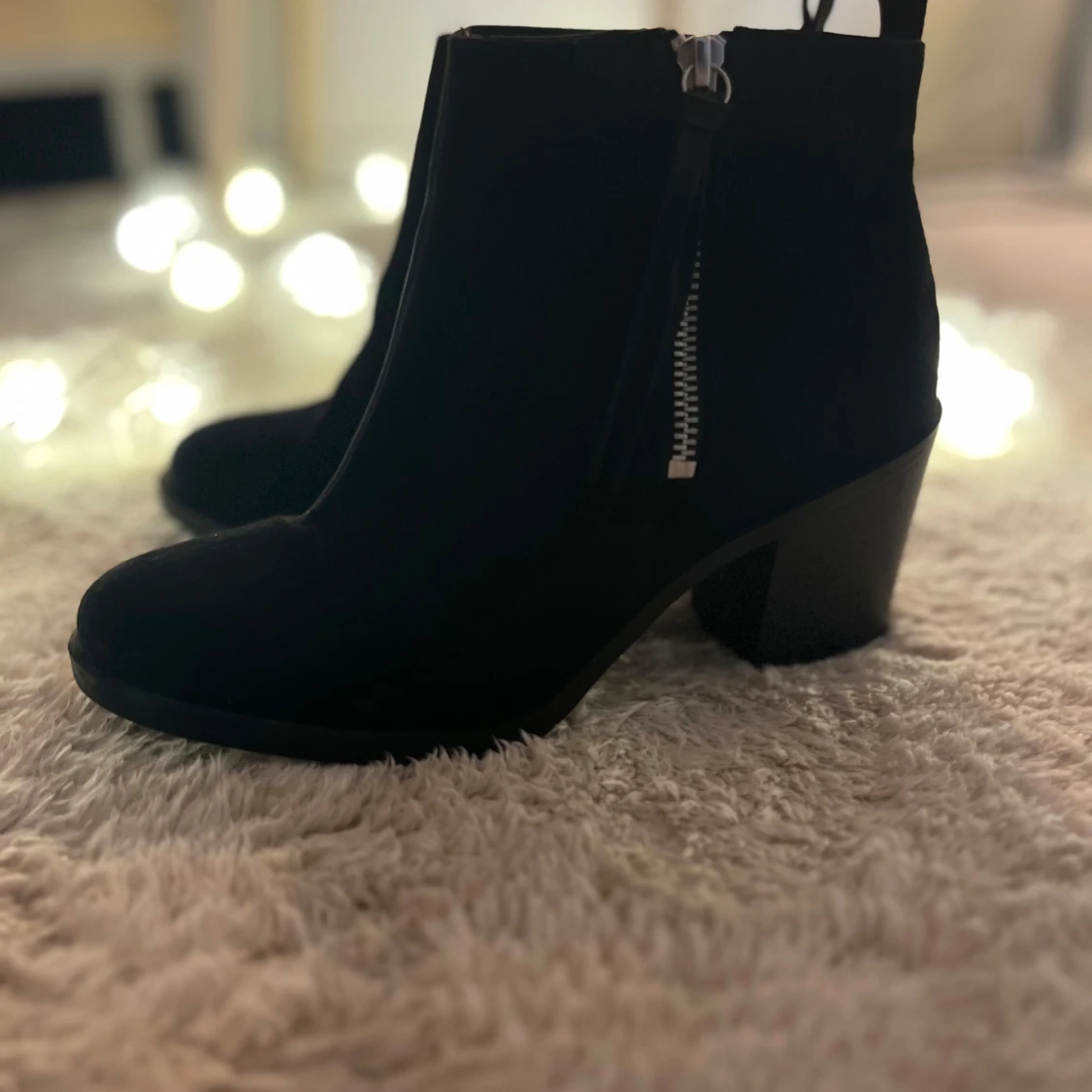 Svarta boots med dragkedja