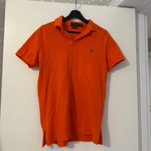 Ralph Lauren piké Herr - Orange Ralph Lauren piké till Herr. 