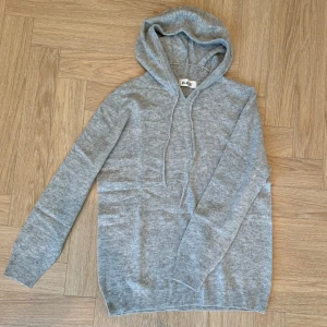 G.O.T Merino hoodie - Storlek XL