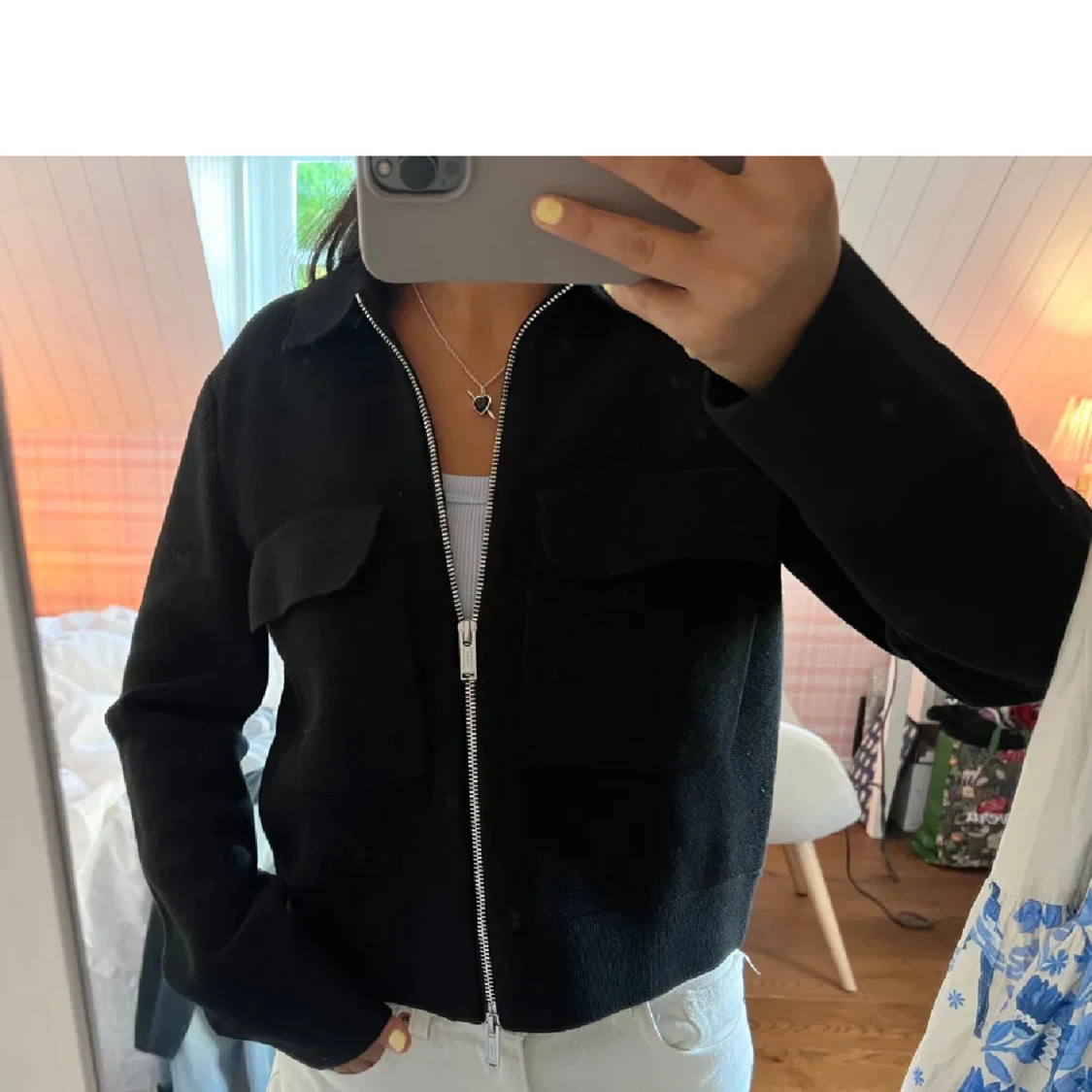 Svart stickad bomullsjacka