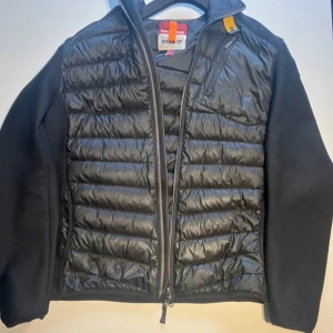 Parajumper Nolan - Bra skick men har ett litet hål vid handleden