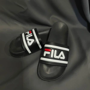 Fila tofflor  - Helt nya 