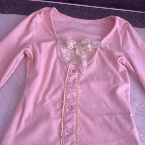 Tröja - Stil rosa töja xs/xss.