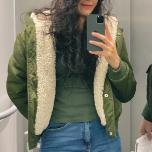 Reversible teddy green jacket - Brand: Zara Size : 36/ small Reversible green jacket with buket hat set with color of jacket 