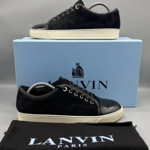 Svarta sneakers från Lanvin - Tja säljer nu mina lanvins dbb1 strl 41. de är lite repiga/smutsiga på undersidan annars är allt perfekt 👌 