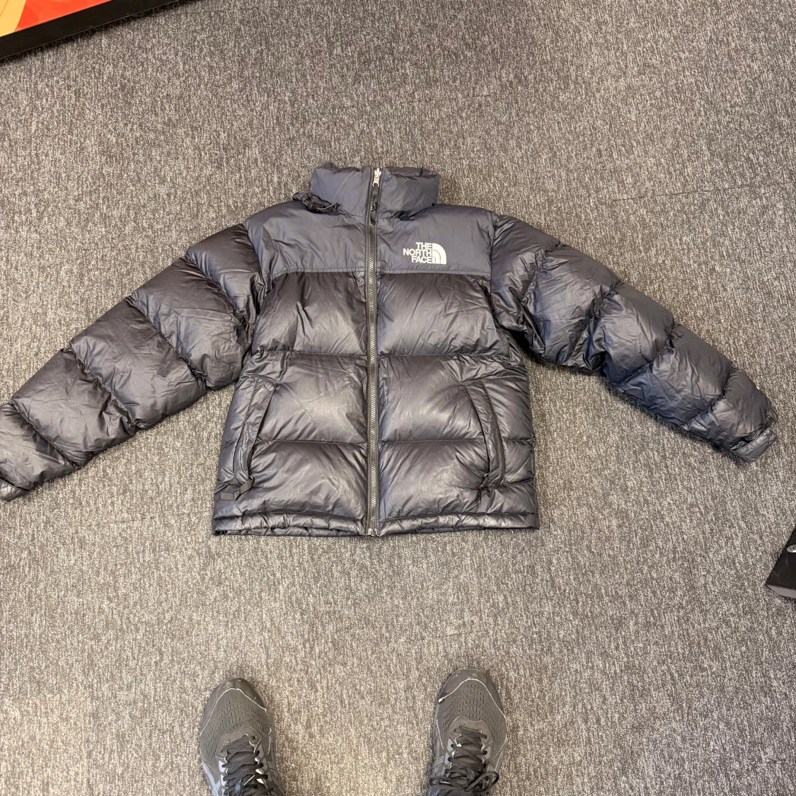 Svart dunjacka från The North Face