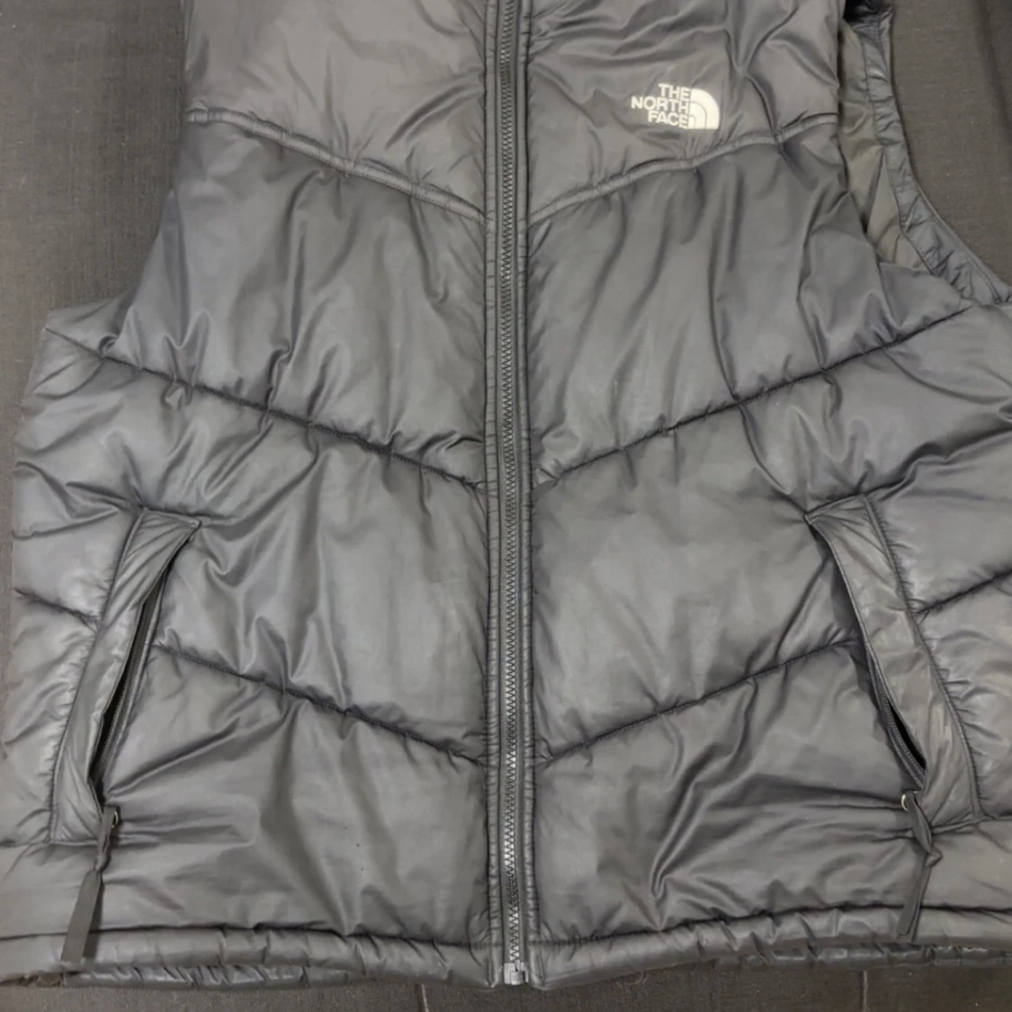 Svart dunväst från The North Face storlek L - 1