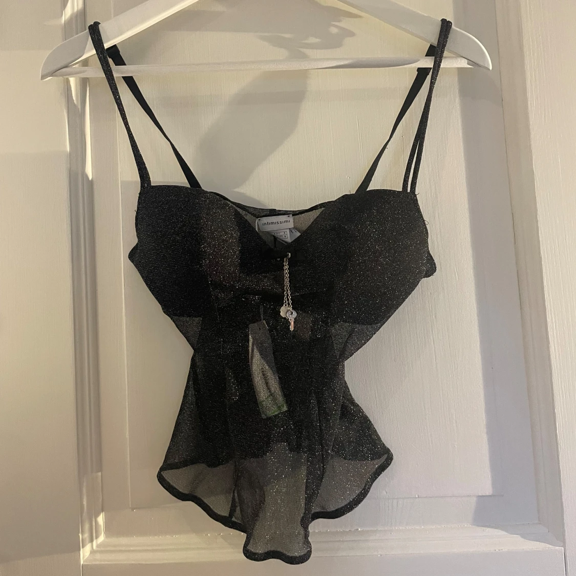 Glittrig intimissimi topp