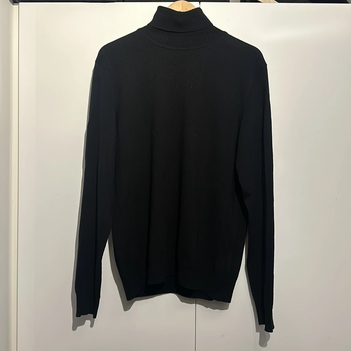 Svart polotröja från J.Lindeberg