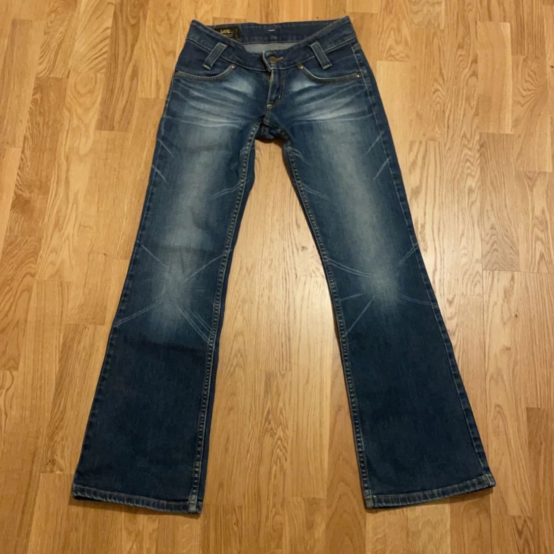 Blå bootcut jeans från Lee - 91