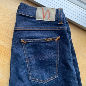 Nudie Jeans - Nudie Jeans i storlek 30/32, nyskick utan några som helst deffekter. Skriv om du har funderingar😀