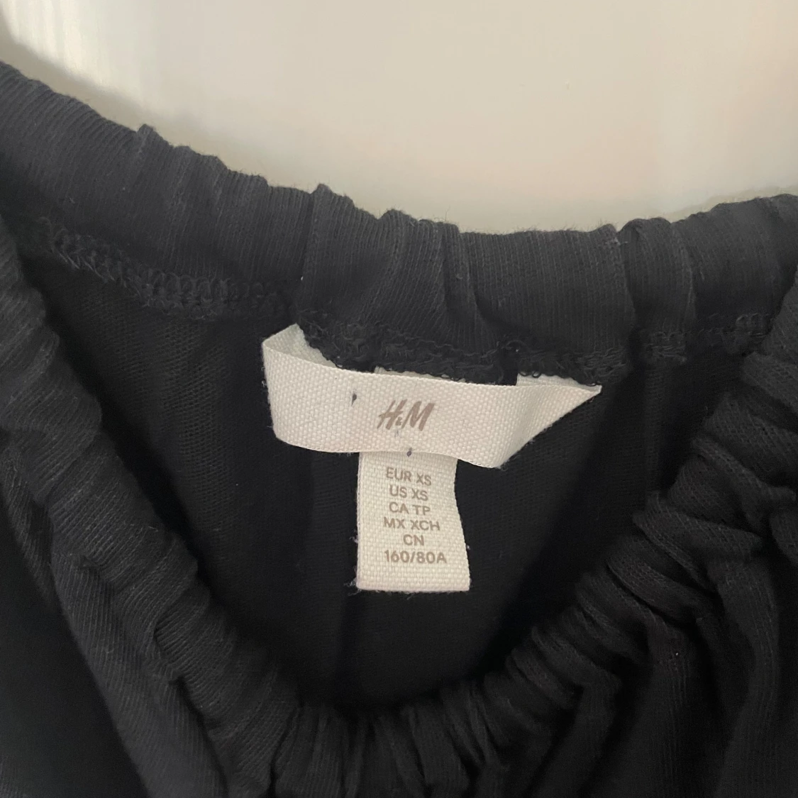 Svart midiklänning m öppen rygg - 91