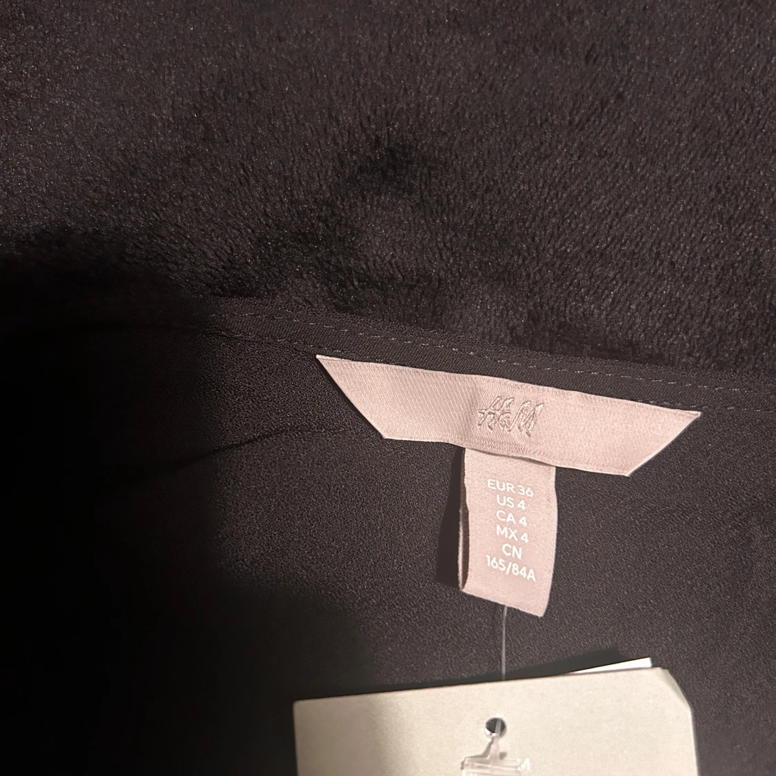 Svart långärmad blus - H&M - 90