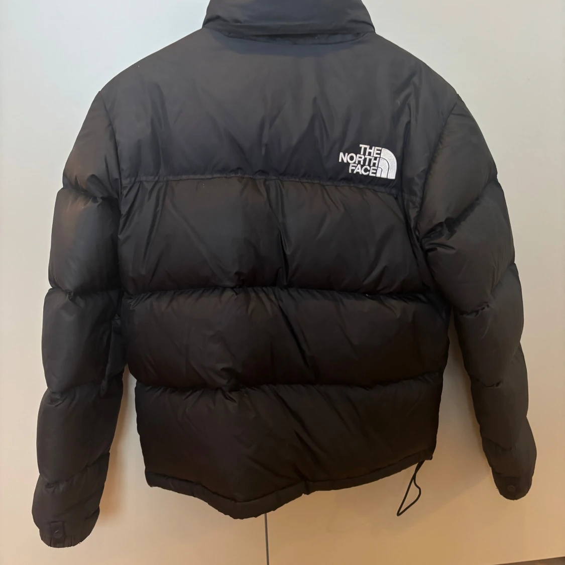 Svart dunjacka från The North Face - 90