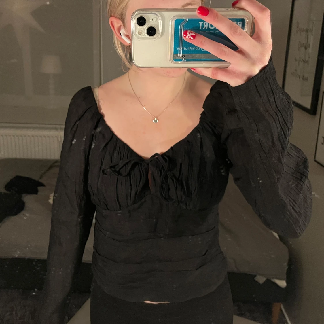 Svart topp med rosett - 90