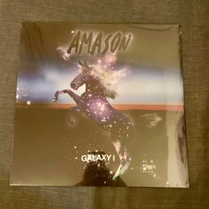 Amason - Galaxy I LP, vinyl, ospelad  - Vinylskiva av Amason med titeln 'Galaxy I'. Ospelad, oöppnad.