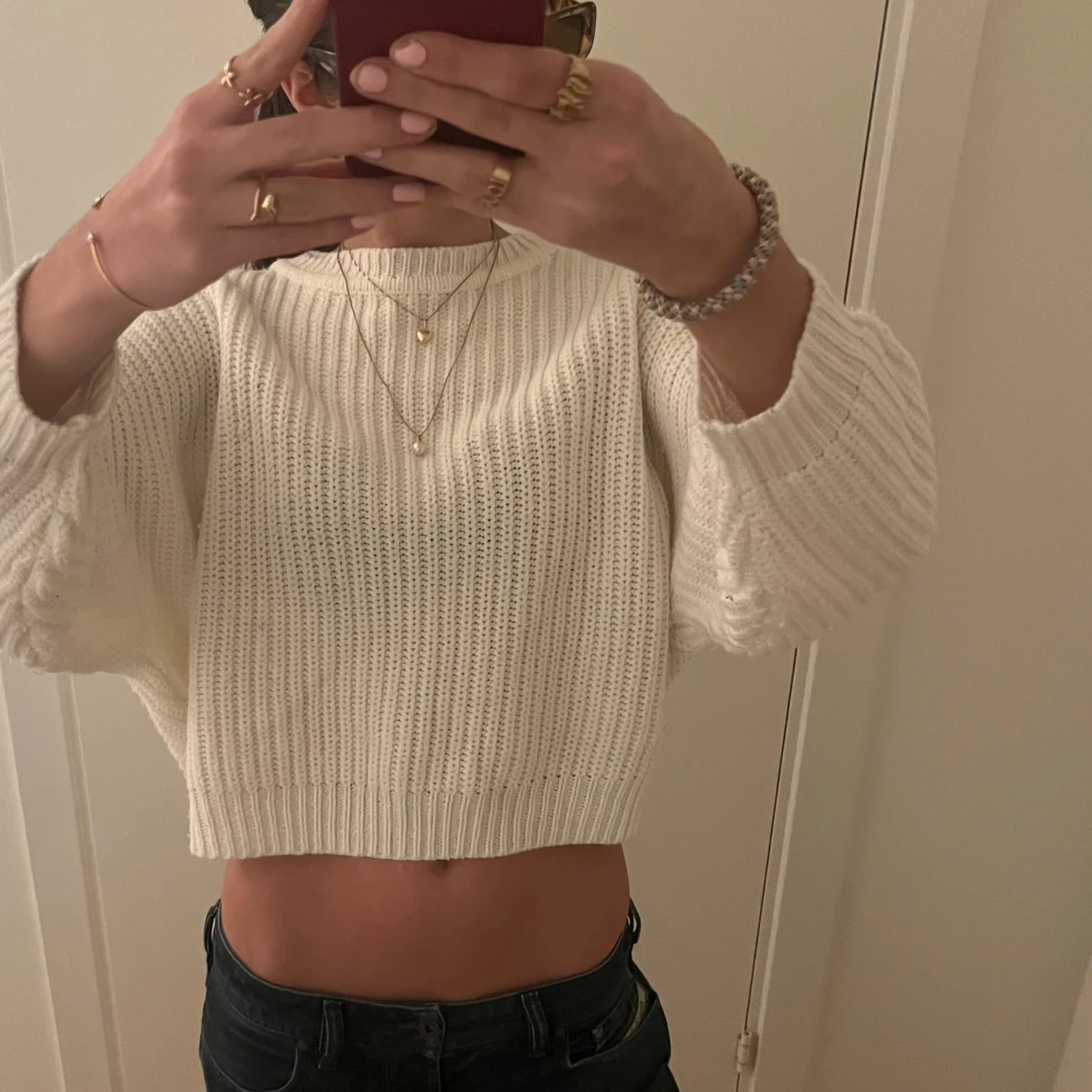 Vit stickad croppad tröja