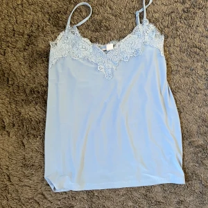 Blått linne - Storlek xs  Från new yorker 